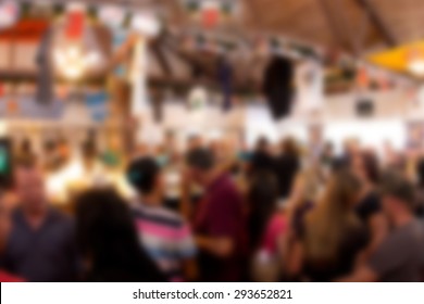 Defocused Blur Scene Of Crowded Bar At Beer Garden