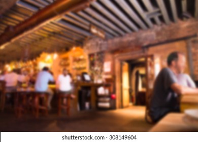 Defocused Blur Of Scene Inside Restaurant Pub And Bar