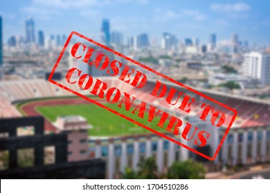 Defocused, Blurred View Of Football Stadium Or Sports Arena, Empty And Closed Due To Coronavirus Or Covid 19 Pandemics