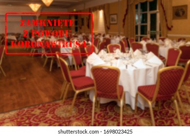 Defocused, Blurred View Of Interior Of An Upmarket Wedding Venue Or Restaurant, Empty And Closed With Polish Notice Closed Due To Coronavirus