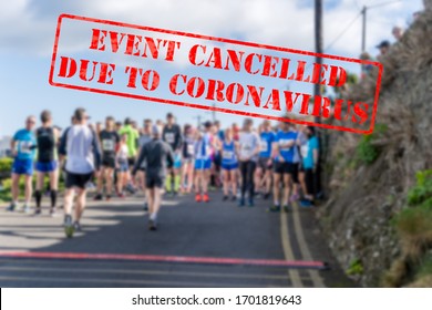 Defocused, Blurred View Of Sport Contestants In A Row On A Start Of Marathon Race. Sports Event Cancelled Due To Coronavirus Or Covid 19 Pandemics