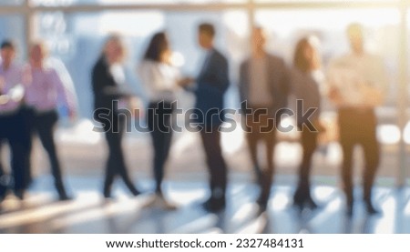 Defocused bokeh effect positive concept background of unrecognizable people diverse business team meeting of young professionals corporate startup
