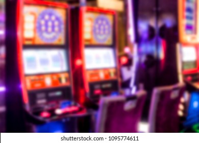 Defocused casino slot machine blur with colorful lights - Shutterstock ID 1095774611