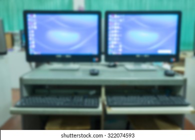 Defocused Classroom computers for background.