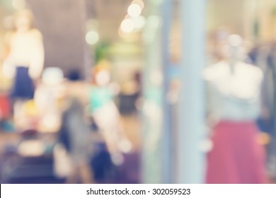 Defocused Clothing Store Front Entrance Displaying Woman's Fashion