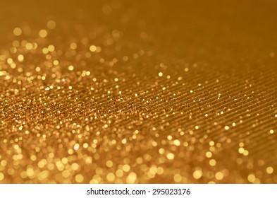 Defocused and colorized luxurious glittering background / Glittering background / Ideal for festive season, holiday and party celebration promotions - Shutterstock ID 295023176