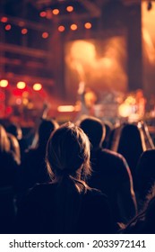 De-focused Concert Stage With Laser Lights And Beams.