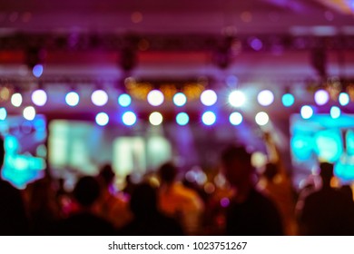 Defocused entertainment concert lighting on stage, blurred disco party and Concert Live - Shutterstock ID 1023751267