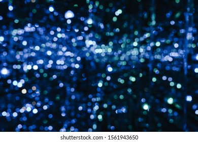 Defocused entertainment concert lighting on stage, blurred disco party and Concert Live. - Shutterstock ID 1561943650