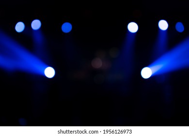 Defocused Entertainment Concert Lighting On Stage. Blue Stage Lights. Colorful Bright Stage Lights In Concert. Bokeh Banner Background.