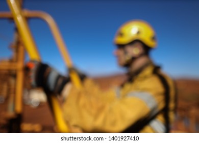 Defocused Good Safety Practice Of Miner Walking Holding Hand Rail With Three Point Of Contact While Working On Construction Mine Site, Sydney