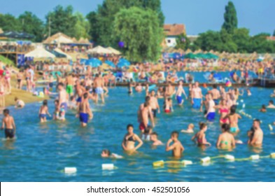 De-focused image of crowded beach
