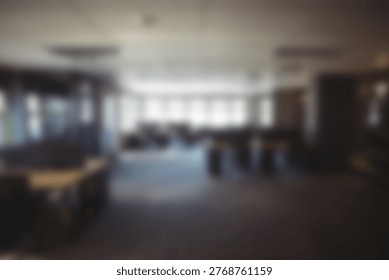 Defocused image of table and empty chairs in modern office