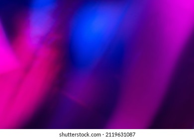 Defocused neon glow. Light flare overlay. Futuristic led illumination. Blur ultraviolet magenta pink purple blue color radiance on dark abstract background.
