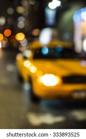 Defocused New York City Yellow Taxi Cab Blur At Night