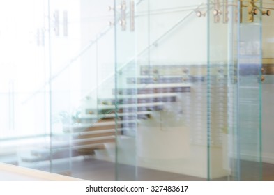 Defocused Office Building Lobby or hospital Background. Image staircase, glass walls and doors. Modern interior.