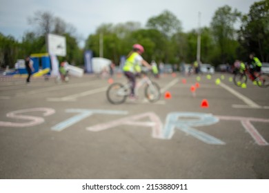 Defocused Photo, START Line Of A Bicycle Triathlon Race Event. 