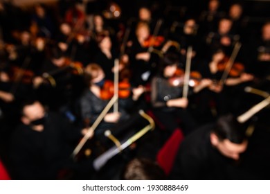 Defocused picture of orchestra in theatre