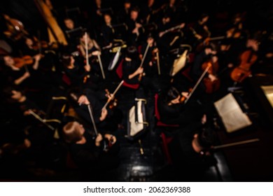 Defocused picture of orchestra in theatre