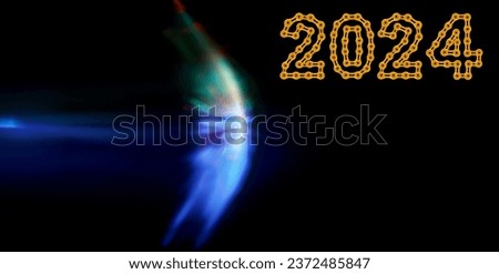 defocused sound barrier light effect on dark background, with 2024 Happy New Year made from golden chain links