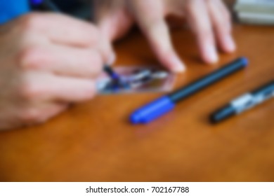 De-focused Star Gives Autographs