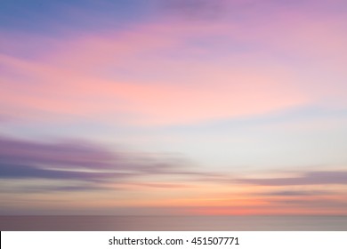 Defocused sunset sky   ocean nature background and blurred panning motion 