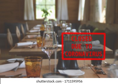 Defocused View Of Interior Of An Empty Restaurant Closed Due To Coronavirus. Concept For Economical Tourism Crisis