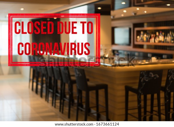 Stock photo of a closed bar in upmarket hotel or cruise ship with sign saying closed due to coronavirus