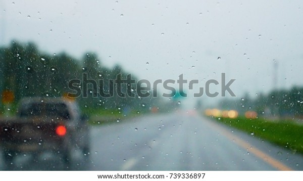 Defocussed\
blurry driver\'s driving point of view\
(pov)