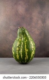 Deformed Ugly Watermelon. Pear- Shaped Watermelon. Concept - Food Waste Reduction. Eating Imperfect Foods.