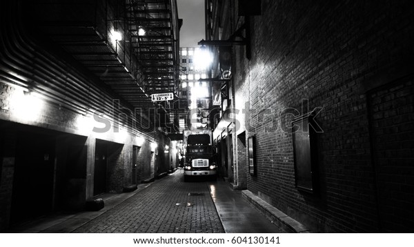 Defous of truck in the\
alley at night