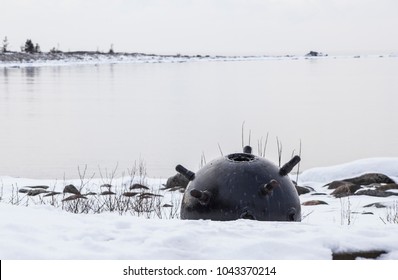 Defused Naval Mine From World War 1 On The Beach By The Baltic Sea In The Winter.