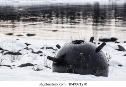 Defused Naval Mine From World War 1 And 2, Now Used For Decoration Outdoors In Winter By The Sea Water. 