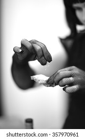 Degustation Of Mussels, Closeup Of Woman's Elegant Hands In Fishnet Gloves Holding A Shell