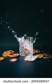 Dehydrated Citrus Fruit Oranges Blood Orange And Lemon Dragon Fruit Cocktail In A Glass With Ice Spash Tonic Black Background Product Photography Citrus Wheels Nightlife