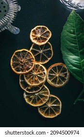 Dehydrated Citrus Fruit Oranges Blood Orange And Lemon Dragon Fruit Cocktail In A Glass With Ice Spash Tonic Black Background Product Photography Citrus Wheels Nightlife