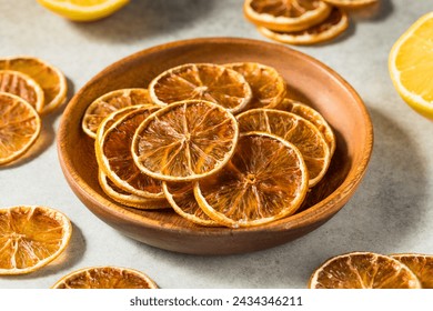 Dehydrated Dry Lemon Slices in a Bowl - Powered by Shutterstock