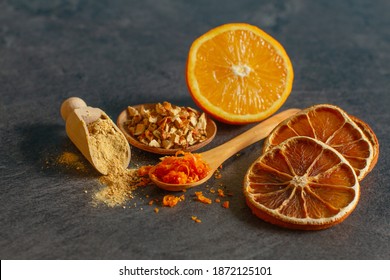 Dehydrated Orange Peel Rind, Powder And Fresh  Orange Zest On A Table. 