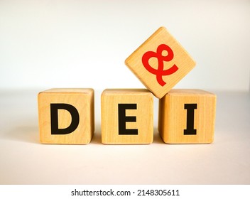 DEI, Diversity, equity and inclusion symbol. Concept words DEI, diversity, equity and inclusion on wooden cubes on beautiful white background. Business, DEI, diversity, equity and inclusion concept.