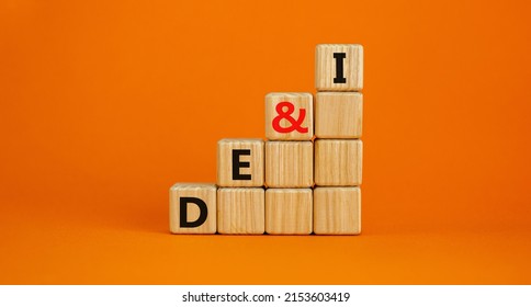 DEI, Diversity, equity and inclusion symbol. Concept words DEI, diversity, equity and inclusion on wooden cubes on beautiful orange background. Business, DEI, diversity, equity and inclusion concept.