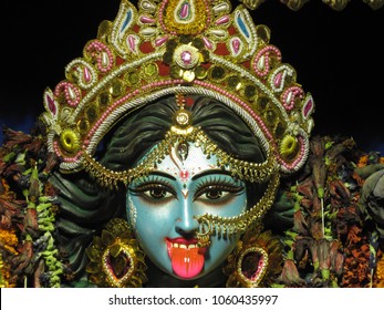 Deity of god Kali in blue face colour