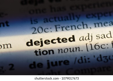 dejected word in a dictionary. dejected concept