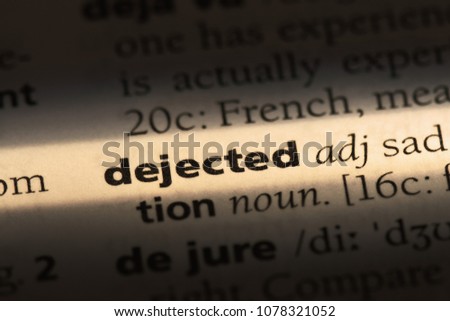 dejected word in a dictionary. dejected concept