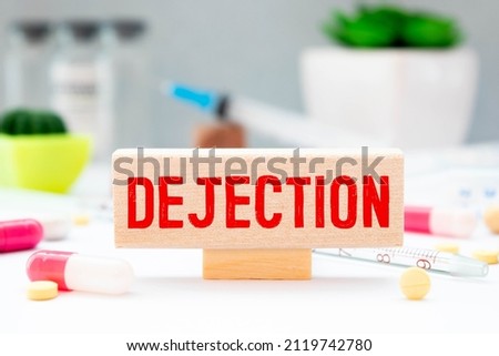 dejected word in a dictionary. dejected concept.