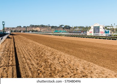 DEL MAR, CALIFORNIA - NOVEMBER 25, 2016:  Tote board and dirt track of the second largest horse racing venue in the western United States.    