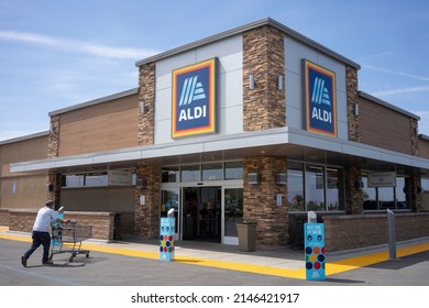 Delano, CA, USA - Mar 26, 2022: Exterior view of an Aldi grocery store in Delano, California. Aldi is the common brand of two German family-owned multinational discount supermarket chains.
