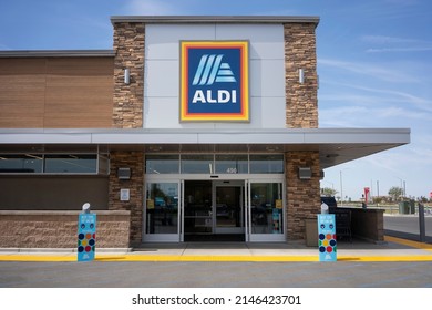 Delano, CA, USA - Mar 26, 2022: Front view of an Aldi grocery store in Delano, California. Aldi is the common brand of two German family-owned multinational discount supermarket chains.