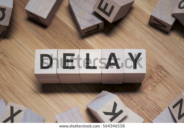 delay-word-wooden-cube-stock-photo-edit-now-564346558