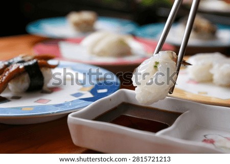 A delectable assortment of sushi, representing the exquisite flavors and presentation of Japanese food.