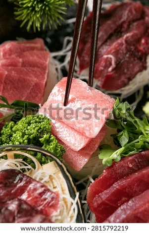 A delectable serving of tuna sashimi, emphasizing the quality and freshness of the premium fish.